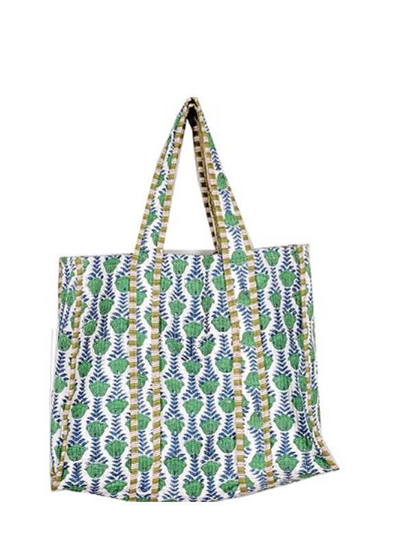 Reusable shopping bag with green and blue pattern on a white background