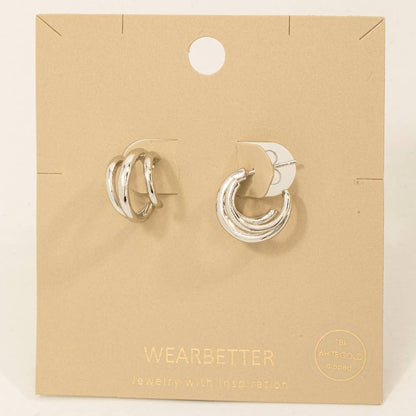 Silver hoop earrings on a 'Wearbetter' branded card