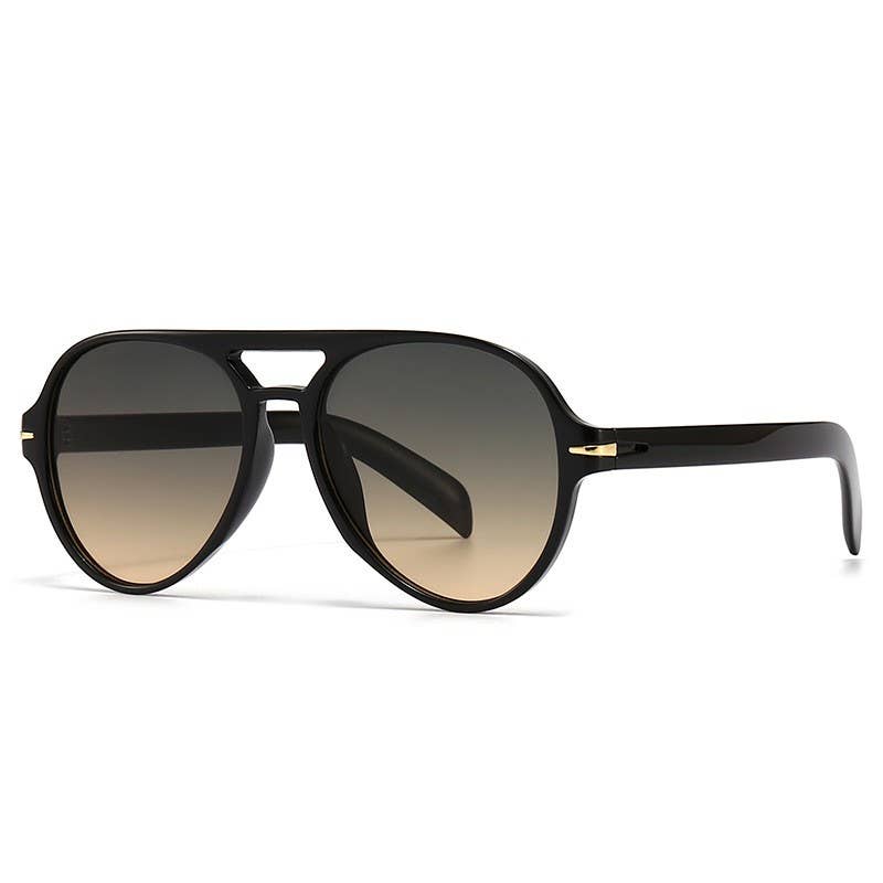 Black sunglasses with gradient lenses on a white background