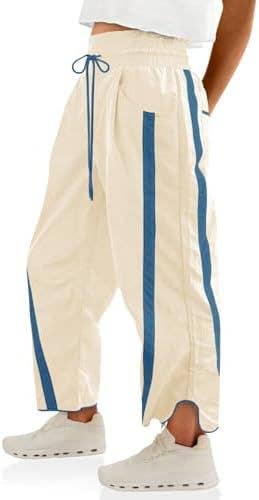 Beige pants with blue stripes worn by a person on a white background