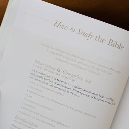 Book open to a page titled 'How to Study the Bible' with text on observation and comprehension.