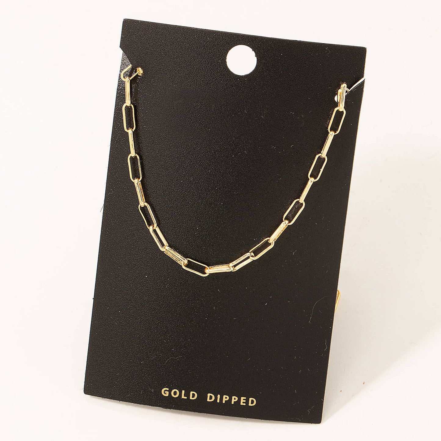 Gold-dipped necklace on a black card with 'Gold Dipped' text.