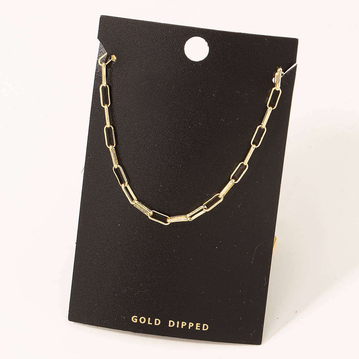 Gold-dipped necklace on a black card with 'Gold Dipped' text.
