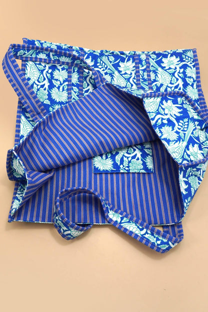 Blue and white patterned fabric on a beige background